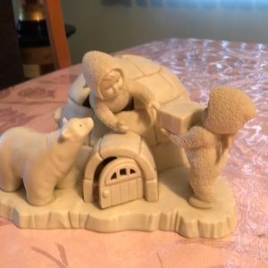 Department 56 snow babies and a bear by an igloo